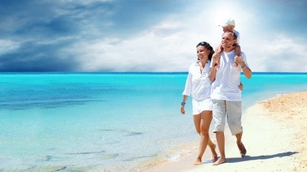Family walking on the beach